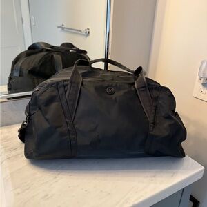 Lululemon Athletica Black Duffel Bag for Versatile Use